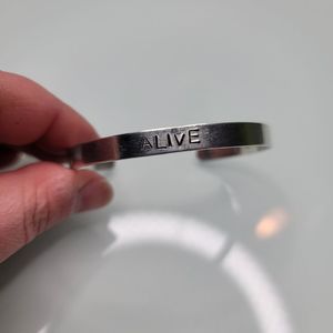 Artisan made Alive silver bracelet with stamped verse inside Christian